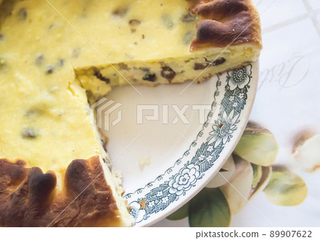 Culinary pie with pot cheese and raisins Culinary pie with pot cheese and raisins 89907622