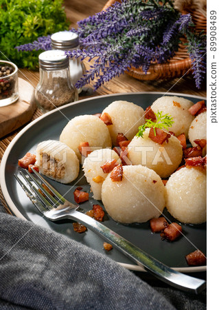 Meat stuffed potato dumplings. 89908489
