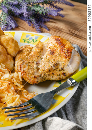 Fried chicken breast. 89908583