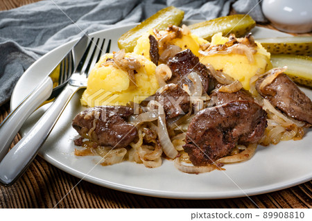 Fried liver with onion. 89908810