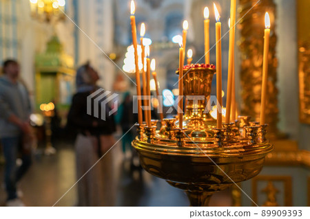 Burning candles in an Orthodox church Burning candles in an Orthodox church 89909393