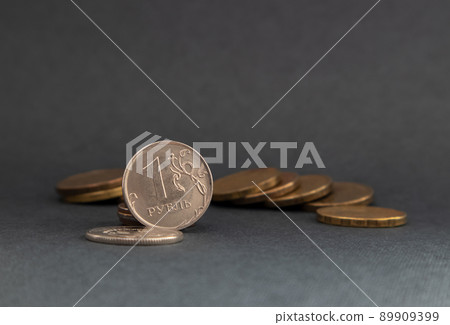 Russian money. Coins of different denominations. Close-up of the ruble. Financial concept. Russian money. Coins of different denominations. Close-up of the ruble. Financial concept. 89909399