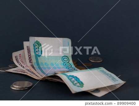 Russian money. Different denomination of bills. Close-up of Russian rubles. Finance concept. Money background and texture. Russian money. Different denomination of bills. Close-up of Russian rubles. Finance concept. Money background and texture. 89909400