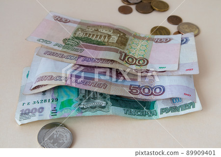 Russian money. Different denomination of bills. Close-up of Russian rubles. Finance concept. Money background and texture. Russian money. Different denomination of bills. Close-up of Russian rubles. Finance concept. Money background and texture. 89909401