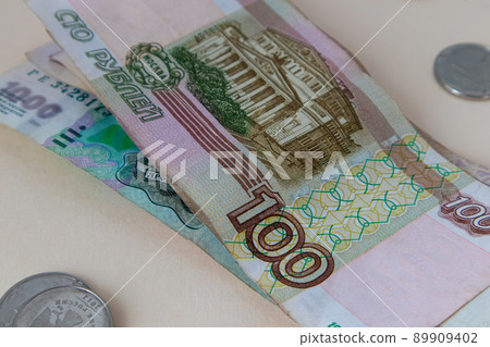 Russian money. Different denomination of bills. Close-up of Russian rubles. Finance concept. Money background and texture. Russian money. Different denomination of bills. Close-up of Russian rubles. Finance concept. Money background and texture. 89909402