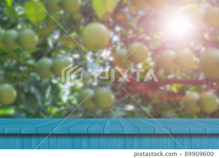 wooden table and blur orange garden farm with sunlight background. for product display template 89909600