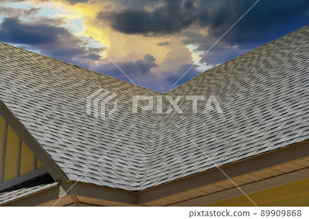 Rooftop construction on roof covered asphalt shingles roofing construction new house Rooftop construction on roof covered asphalt shingles roofing construction new house 89909868
