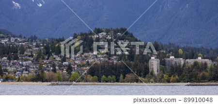 Residential Homes in a modern city with mountain landscape in background. Residential Homes in a modern city with mountain landscape in background. 89910048