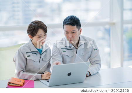 Engineer reviewing work content Engineer reviewing work content 89912366