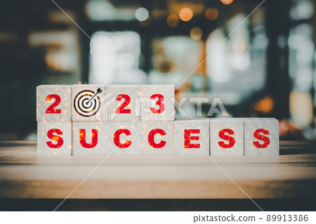 2023 numbers and words of success on wooden cube blocks with abstract bokeh interior room background 2023 numbers and words of success on wooden cube blocks with abstract bokeh interior room background 89913386