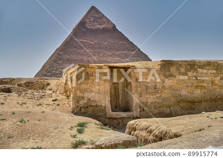 Ancient tomb and the Pyramid of Khafre (Pyramid of Chephren) in Cairo, Egypt Ancient tomb and the Pyramid of Khafre (Pyramid of Chephren) in Cairo, Egypt 89915774