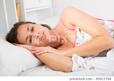 Portrait of adult woman in lingerie sleeping in bed 89915786