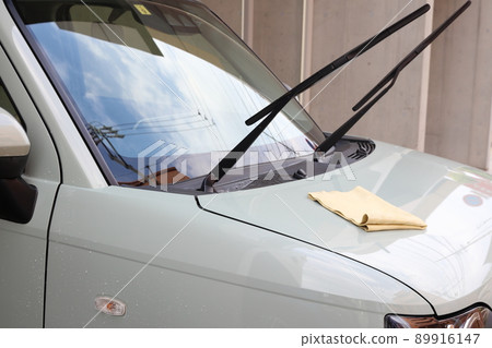 Scenery of car wash while wiping off dirt Scenery of car wash while wiping off dirt 89916147