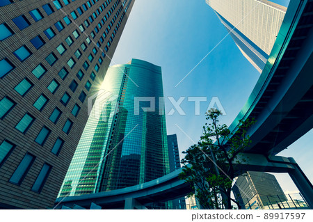 Cityscape of Tokyo Shiodome Skyscraper Street and urban transportation 2022.04 d-4 Warm and cool colors emphasized Cityscape of Tokyo Shiodome Skyscraper Street and urban transportation 2022.04 d-4 Warm and cool colors emphasized 89917597