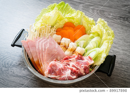 sukiyaki or shabu hot pot black soup with meat raw and vegetable sukiyaki or shabu hot pot black soup with meat raw and vegetable 89917898