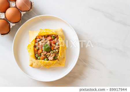 egg wrap or stuffed egg with minced pork and vegetable egg wrap or stuffed egg with minced pork and vegetable 89917944