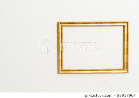 empty picture frame on white wall background empty picture frame on white wall background 89917967
