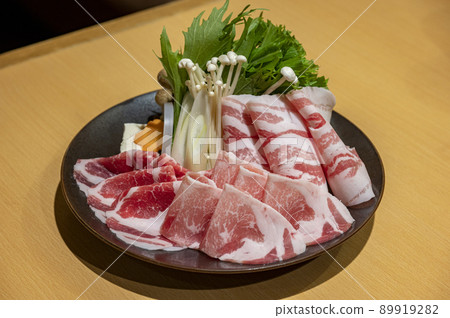 Shabu-shabu: Let the pork go through the soup stock Shabu-shabu: Let the pork go through the soup stock 89919282
