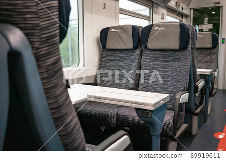 4.10.2021 Milan, Italy - empty passenger compartment of the Trenitalia train. Travelling in Europe 89919611