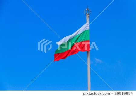 Waving flag of Bulgaria against blue sky Waving flag of Bulgaria against blue sky 89919994