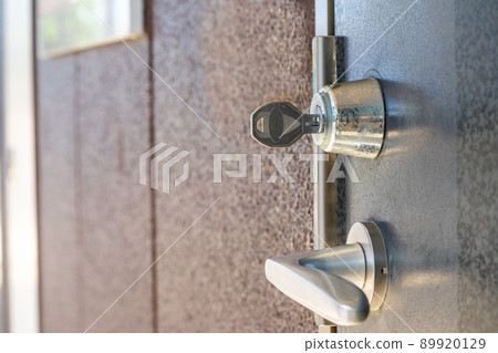 Key inserted in the keyhole 89920129