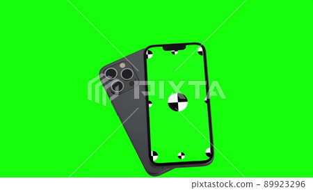 3D render of two smartphone with a green background. Rotating in screen. With a green screen for easy keying. Computer generated image. Easy customizable. 3D render of two smartphone with a green background. Rotating in screen. With a green screen for easy keying. Computer generated image. Easy customizable. 89923296