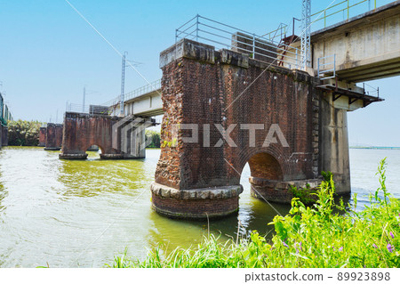 Old bridge on the Onga River 89923898