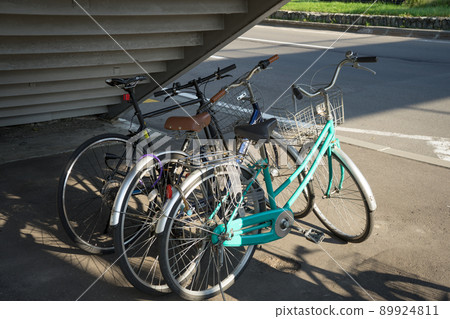 Bicycle under the pedestrian bridge Bicycle under the pedestrian bridge 89924811