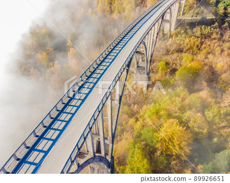 Montenegro. Dzhurdzhevich Bridge Over The River Tara foggy morning 89926651