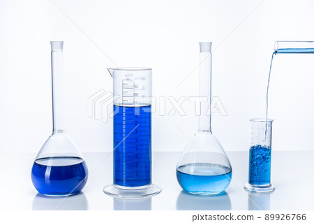 Test tube and flask with blue liquid. Chemistry and laboratory concept. Test tube and flask with blue liquid. Chemistry and laboratory concept. 89926766