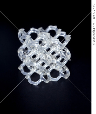 Abstract model printed on 3d printer close-up. Object photopolymer printed on stereolithography 3D printer. Technology of liquid photopolymerization under UV light. New additive 3D printing technology 89927659