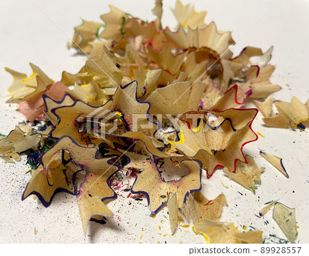 Set of colored pencil shavings on a white background Set of colored pencil shavings on a white background 89928557