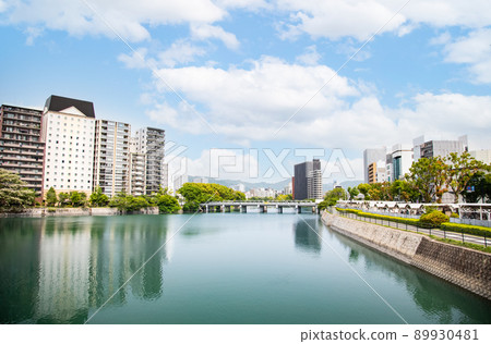 It is the scenery along the Kyobashi River on the south side of Hiroshima Station. You can see hotels and condominiums in Kaminoboricho. Please use it as a background for the cityscape. 89930481