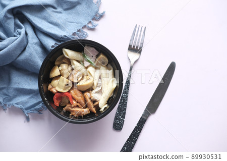 homemade cooked chicken mushroom pasta in a bowl  89930531