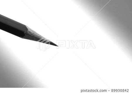 Pencil holding to write on the paper in shadow 89930842