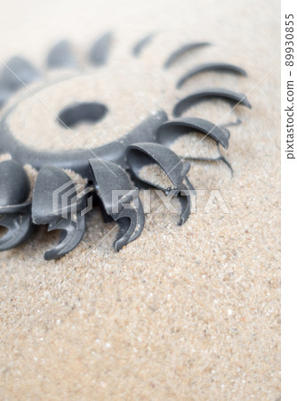 Plastic Pelton water turbine on sand with out water Plastic Pelton water turbine on sand with out water 89930855