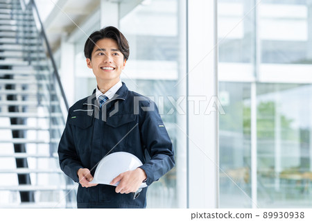 Young worker man 89930938