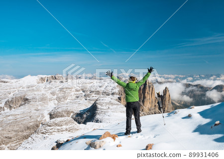 Tourist hiking in mountains Tourist hiking in mountains 89931406