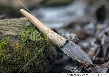 flint knife - stone age tool in nature flint knife - stone age tool in nature 89931434