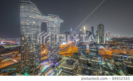 Futuristic Dubai Downtown and finansial district skyline aerial all night timelapse. Futuristic Dubai Downtown and finansial district skyline aerial all night timelapse. 89932583