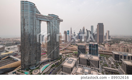 Futuristic Dubai Downtown and finansial district skyline aerial day to night timelapse. Futuristic Dubai Downtown and finansial district skyline aerial day to night timelapse. 89932616