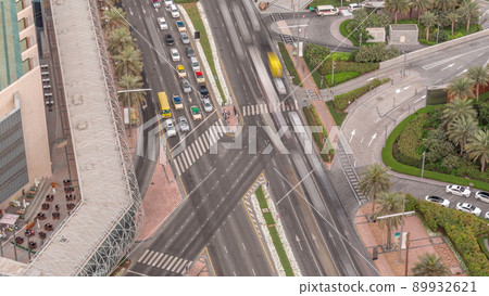 Overhead view of transport on a busy road in Dubai downtown aerial timelapse, United Arab Emirates Overhead view of transport on a busy road in Dubai downtown aerial timelapse, United Arab Emirates 89932621