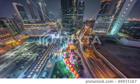 Dubai International Financial district aerial night timelapse. Panoramic view of business and financial office towers. Dubai International Financial district aerial night timelapse. Panoramic view of business and financial office towers. 89933167