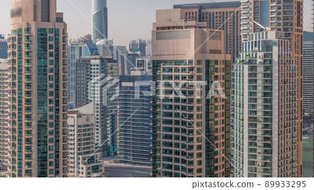 Dubai Marina Skyline with JLT district skyscrapers on a background aerial timelapse. 89933295