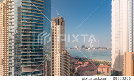 Panoramic view of JBR area and the famous Ferris Wheel aerial morning timelapse Panoramic view of JBR area and the famous Ferris Wheel aerial morning timelapse 89933296