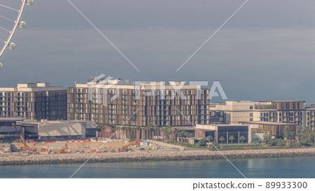 Bluewaters island with modern architecture and ferris wheel aerial timelapse. Bluewaters island with modern architecture and ferris wheel aerial timelapse. 89933300