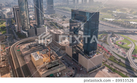 Aerial view of media city and al barsha heights district area all day timelapse from Dubai marina. Aerial view of media city and al barsha heights district area all day timelapse from Dubai marina. 89933526
