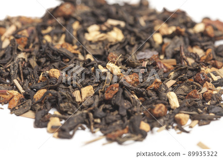 Delicious and healthy herbal green tropical tea with dried fruits texture isolated on white background. 89935322