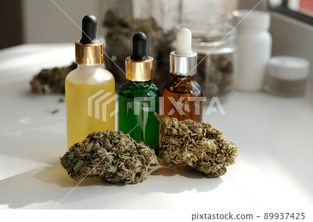 Cannabis buds with cbd oil. Marihuana extract in cosmetology. Cannabis buds with cbd oil. Marihuana extract in cosmetology. 89937425