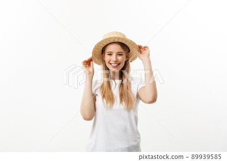 Happiness. Happy summer woman isolated in studio. Energetic fresh portrait of young woman excited cheering in wearing beach hat. Happiness. Happy summer woman isolated in studio. Energetic fresh portrait of young woman excited cheering in wearing beach hat. 89939585